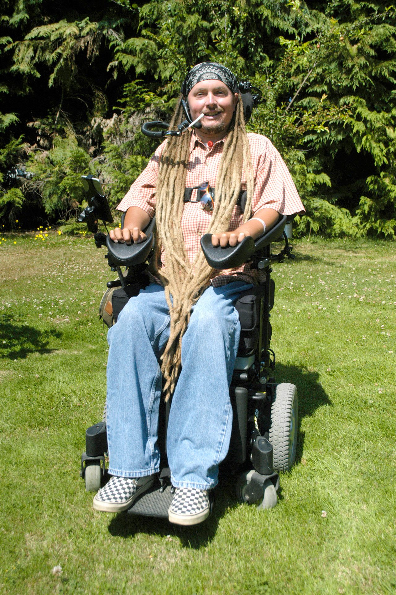 Chris McDaniel/Peninsula Daily News Ian MacKay, seen here, this month will be taking his motorized wheelchair on a 300 mile journey along Washington state’s bike paths and trails - starting in Victoria, British Columbia and ending in Portland, Oregon to raise awareness about the need by wheelchair bound people for access to public trails.