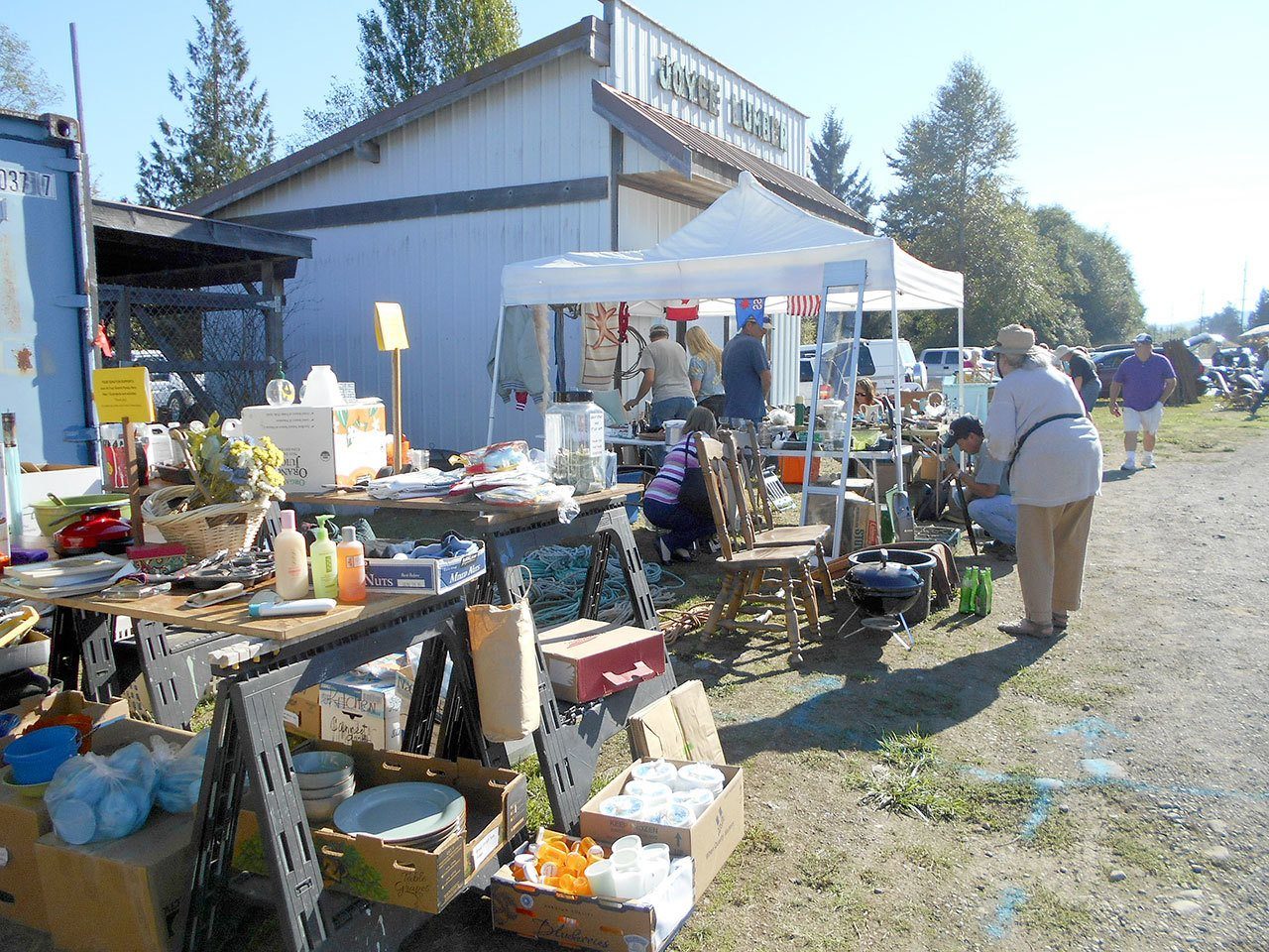 Shoppers look for bargains at last year’s Great Strait Sale on Highway 112 in Joyce. Despite a detour for highway work in Pysht, organizers said the annual event will go in many towns, including Joyce, Clallam Bay, Sekiu and Neah Bay. (Sandra Balch)