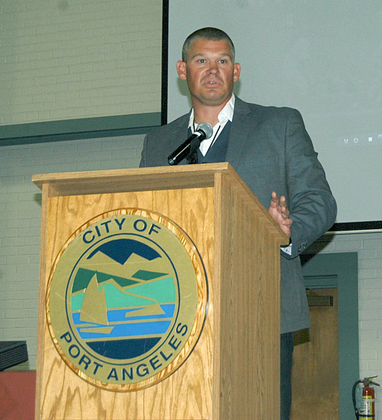 Team co-owner Matt Acker introduces the West Coast League’s newest team, the Port Angeles Lefties, at the Vern Burton Community Center on Thursday. (Rob Ollikainen/Peninsula Daily News)