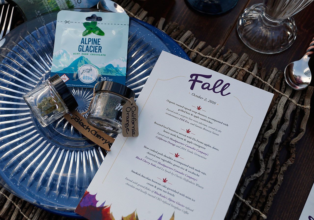 The Associated Press A menu shows the dishes paired with certain strains of pot during an evening of pairings of fine food and craft marijuana strains served to invited guests dining Oct. 2 at Planet Bluegrass, an outdoor venue in Lyons, Colo.