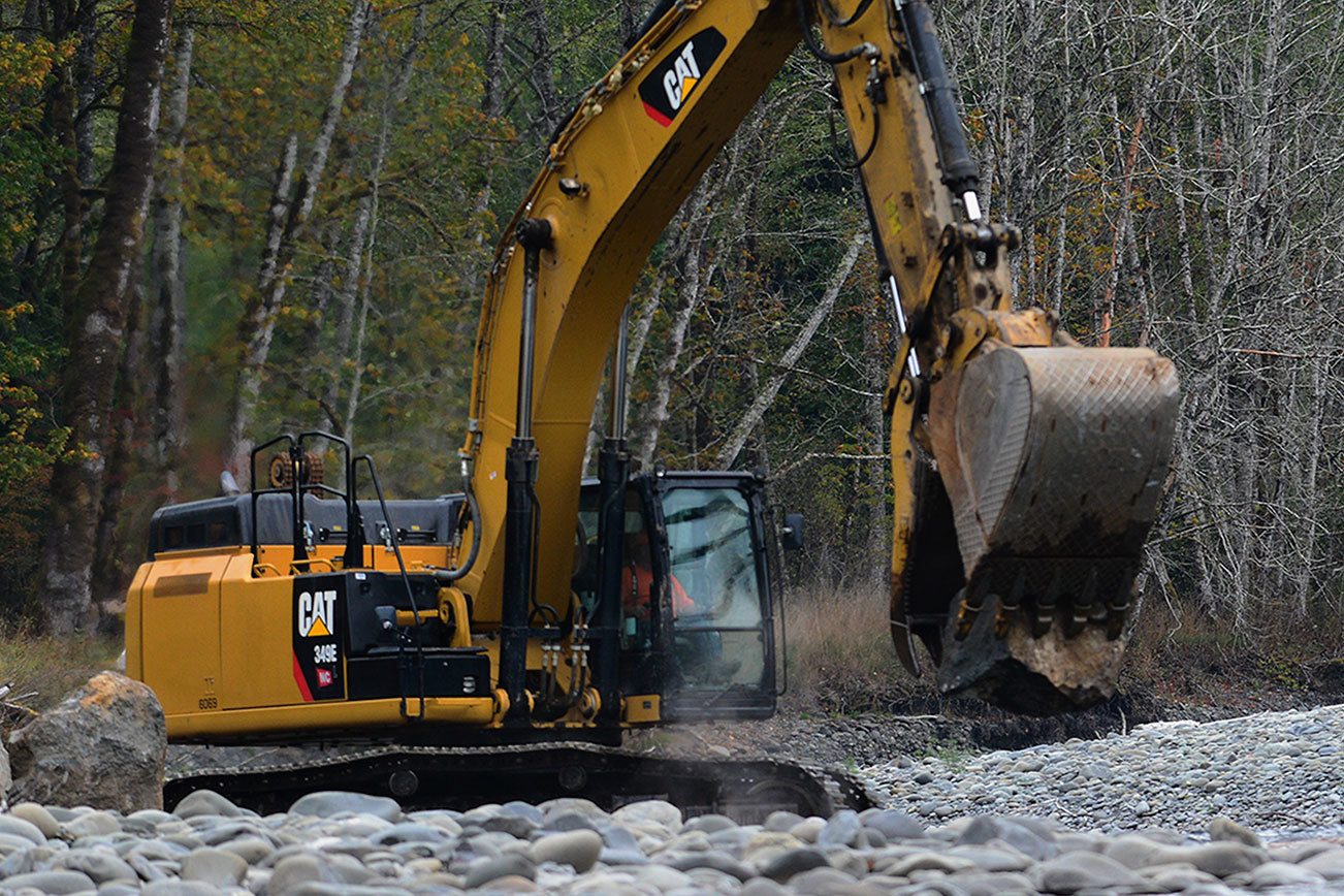 Crews add rip-rap to base of Elwha River bridge piers as storm enters forecast