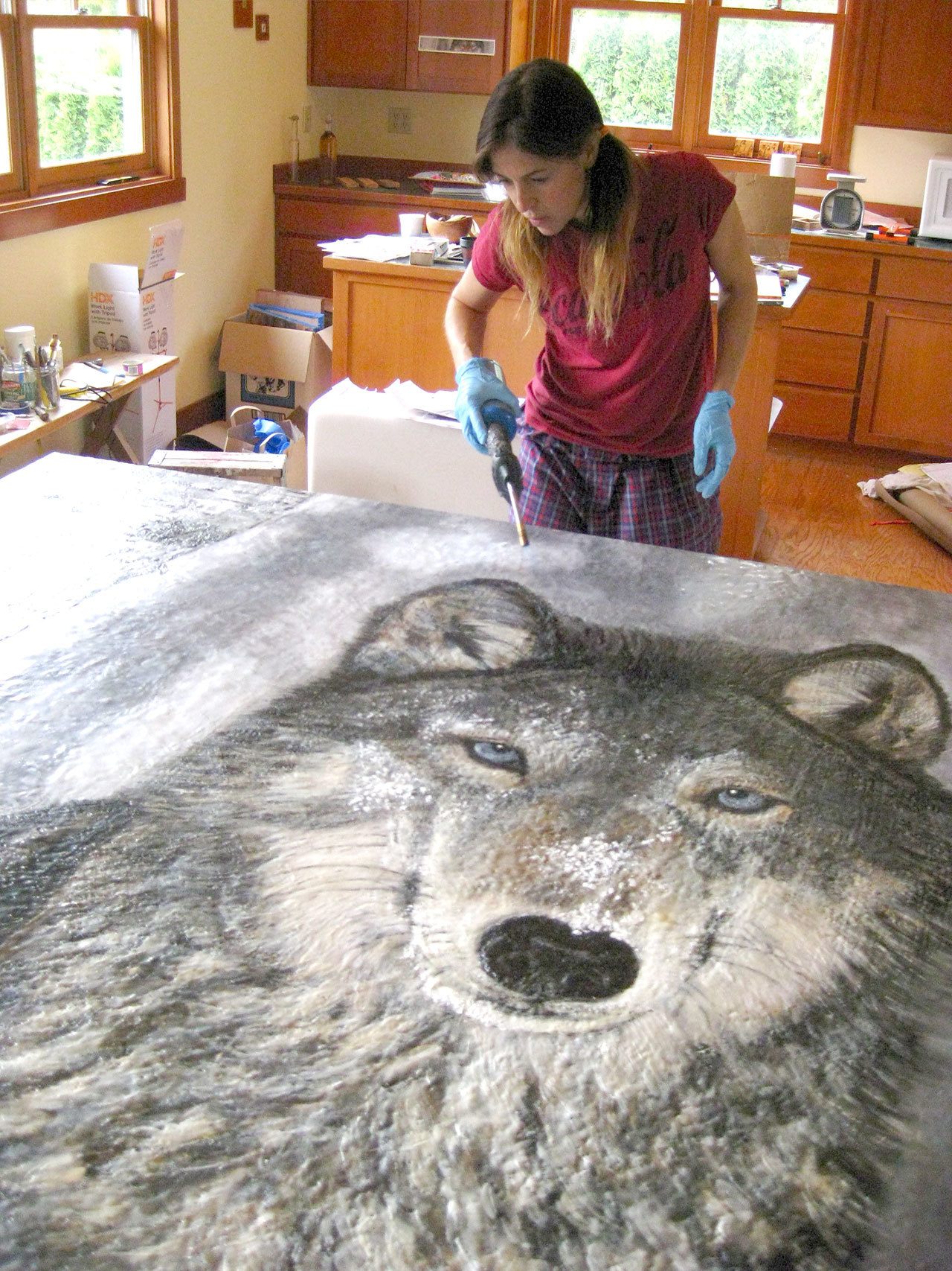 Theresa Stirling of Port Hadlock will demonstrate how she paints with fire and beeswax during Saturday’s Gallery Walk in Port Townsend. (Eric and Theresa Stirling)