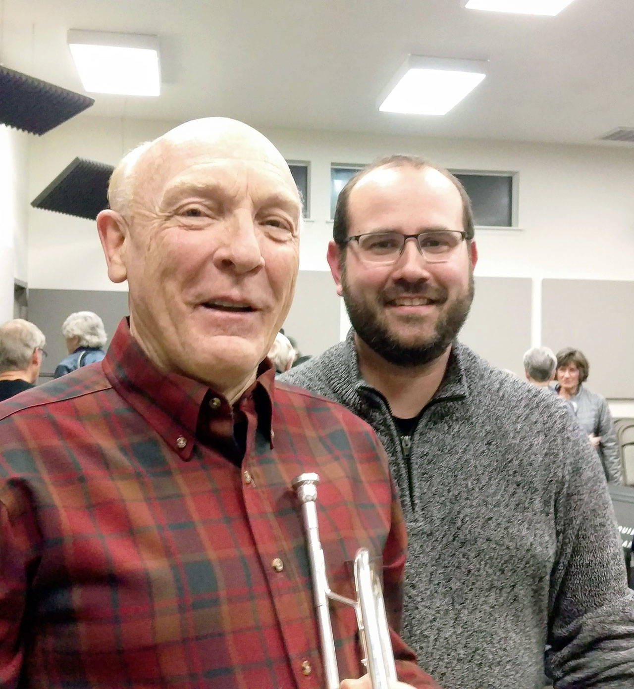 Pictured are soloist Randy Stillwell, left, and Sequim City Band conductor Tyler Benedict.