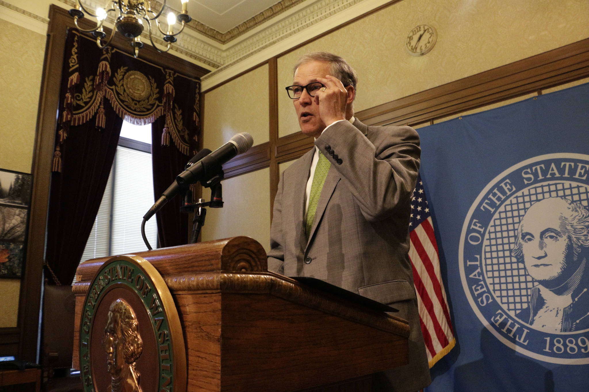 Gov. Jay Inslee talks about the start of a second special session of the Legislature on Tuesday in Olympia. (Rachel La Corte/The Associated Press)