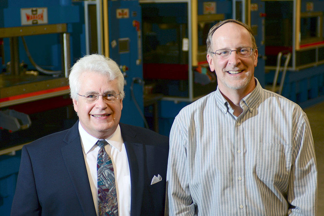 Composite Recycling Technology Center CEO Bob Larsen, left, announced this week he will retire from the nonprofit. Chief Operating Officer David Walter, right, will take the chief executive position for the CRTC when Larsen retires Aug. 11. (Jesse Major/Peninsula Daily News)