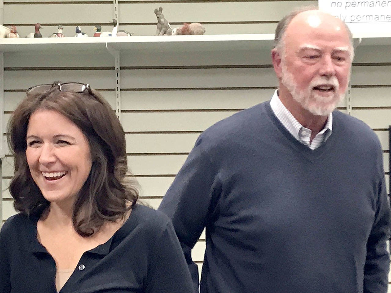 Port of Port Angeles commissioner candidates Colleen McAleer and Michael Cobb chat Wednesday night with participants at a Clallam County Democrats forum. (Paul Gottlieb/Peninsula Daily News)