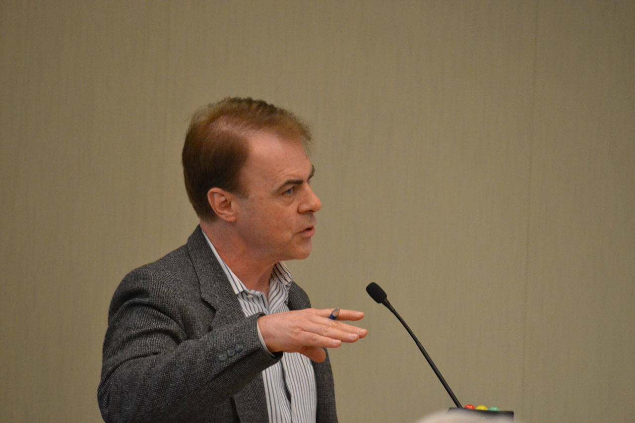 Bob Schroeter, executive director and CEO of the Clallam County Economic Development Corporation speaks to Sequim city councilors Sept. 11 about how he plans to measure his agency’s success for the city. (Matthew Nash/Olympic Peninsula News Group)