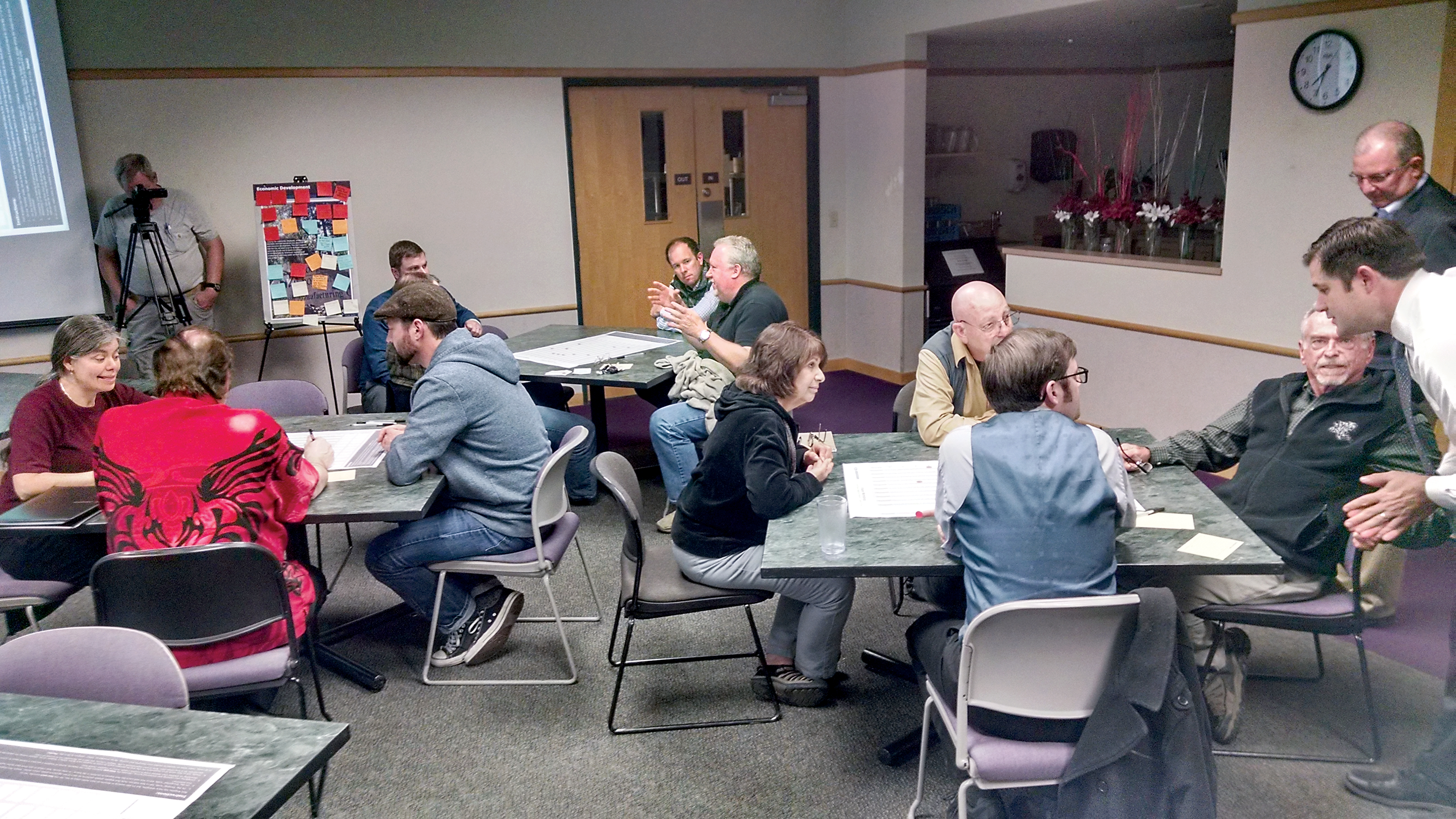 Port Angeles residents discuss 10 elements of the city plan in a comprehensive planning workshop Wednesday evening at the North Olympic Peninsula Skills Center. Each table of participants graded elements of the community and suggested where the city should put its resources. — Arwyn Rice/Peninsula Daily News ()
