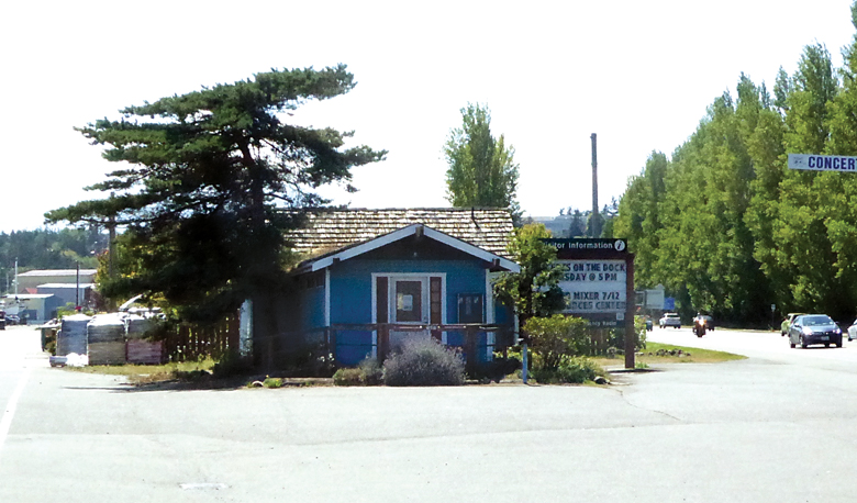 The area around the old visitor center on Sims Way is to be refurbished with a building demolition and landscaping in order to create a warmer welcome to visitors. — Charlie Bermant/Peninsula Daily News ()