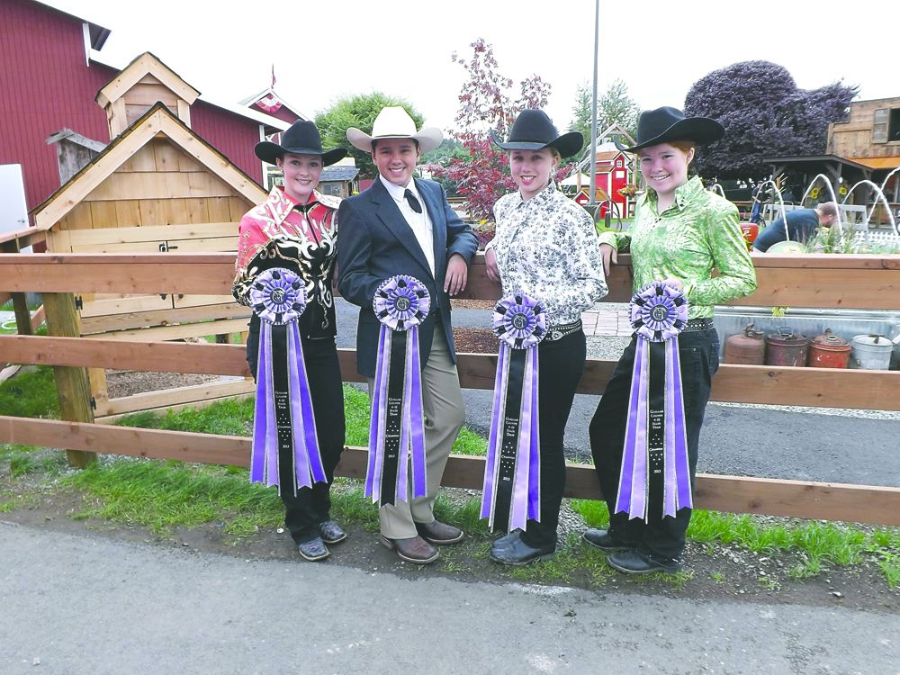 Puyallup State Fair 4-H Intermediate Performance Riders representing Clallam Country with their blue ribbons of truth