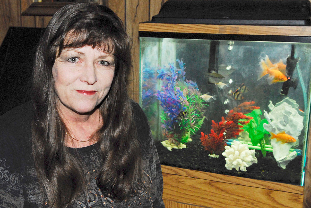 Marie Cota is comfortable in her house thanks to the Home Fund’s assistance. (Jeannie McMacken/for Peninsula Daily News)