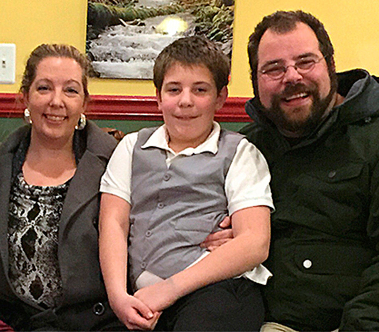 The contest winners who solved the Case of the Silver Lining Secret Formula are, from left, Nancy, Xavier and Travis Caskey of Port Angeles. The case was part of the Sequim-Dungeness Valley Chamber Merchant Group’s and First Friday Art Walk of Sequim’s presentation of the fifth annual Whodunnit Downtown.