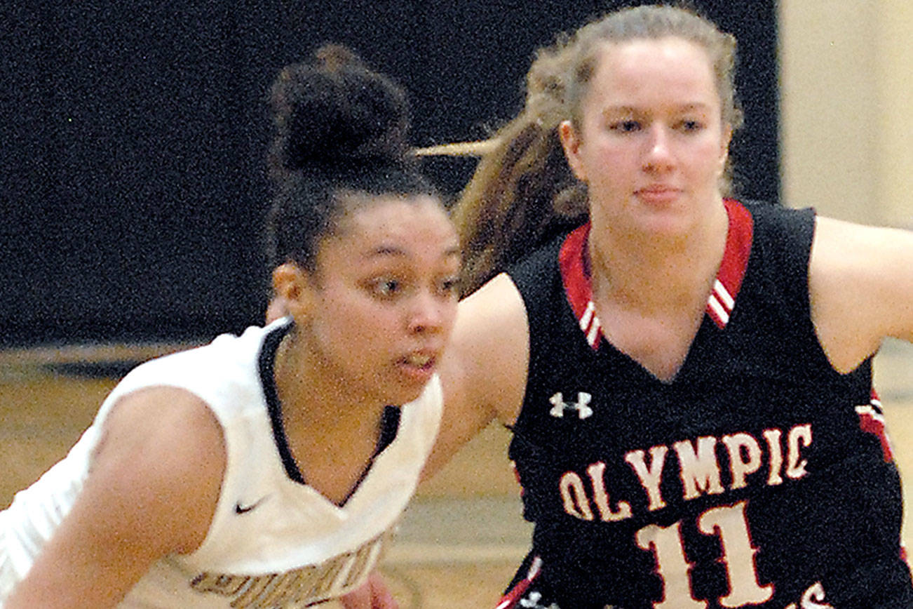 AREA SPORTS BRIEFS: Peninsula men and women sweep Olympic, Port Angeles swimmers to state, Riders’ Clark honored