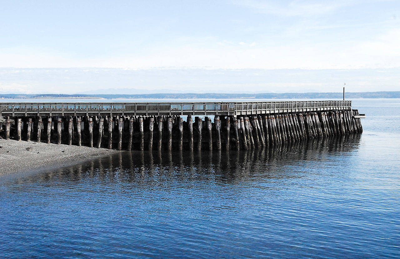 The Port of Port Townsend commissioners agreed to replace the Point Hudson south jetty breakwater, with work beginning this September. The new steel combination wall breakwater includes steel pipe, galvanized steel sheet pile, concrete cap and riprap slopes. Dredging, navigation aids and site restoration are also part of the project. (Jeannie McMacken/Peninsula Daily News)