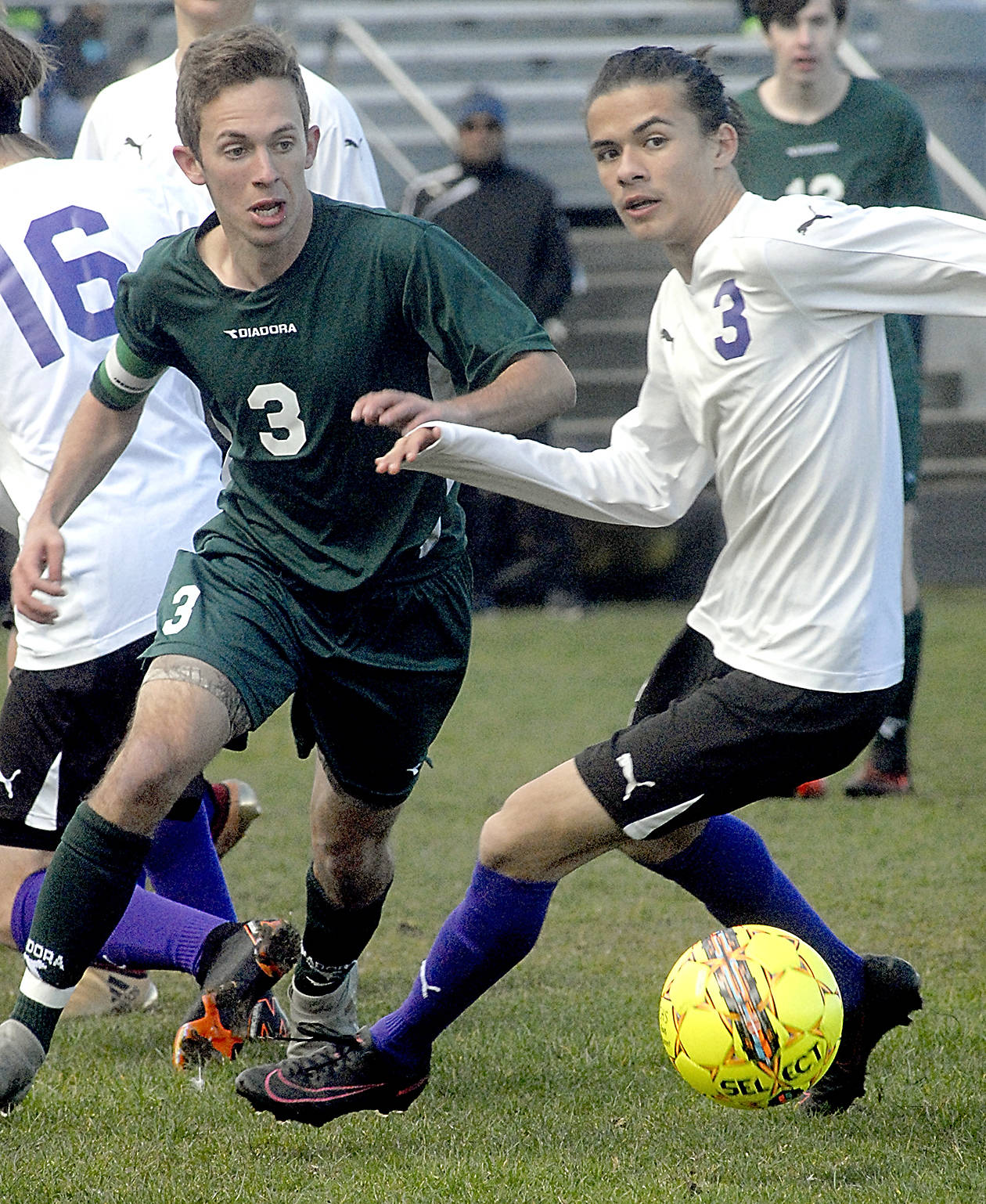 &lt;strong&gt;Keith Thorpe&lt;/strong&gt;/Peninsula Daily News                                Port Angeles’ Andrew St. George, left, and Sequim’s Ryan Tolberd go after a loose ball during Saturday’s match at Sequim High School.