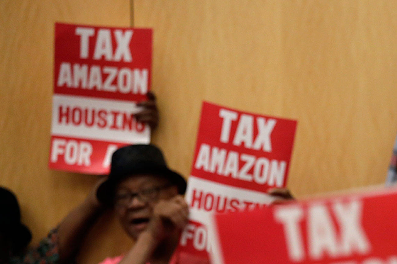 Seattle OKs taxing companies like Amazon to aid the homeless