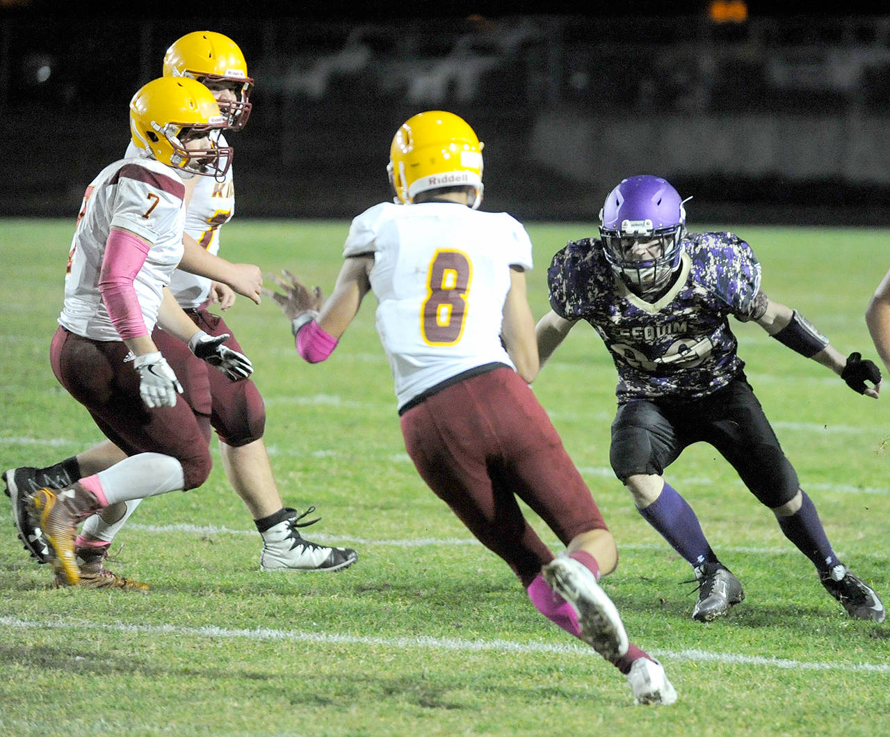 Sequim’s Ben Cowan, right, was a second-team All-Olympic League selection at defensive end last season.                                Michael Dashiell/Olympic Peninsula News Group