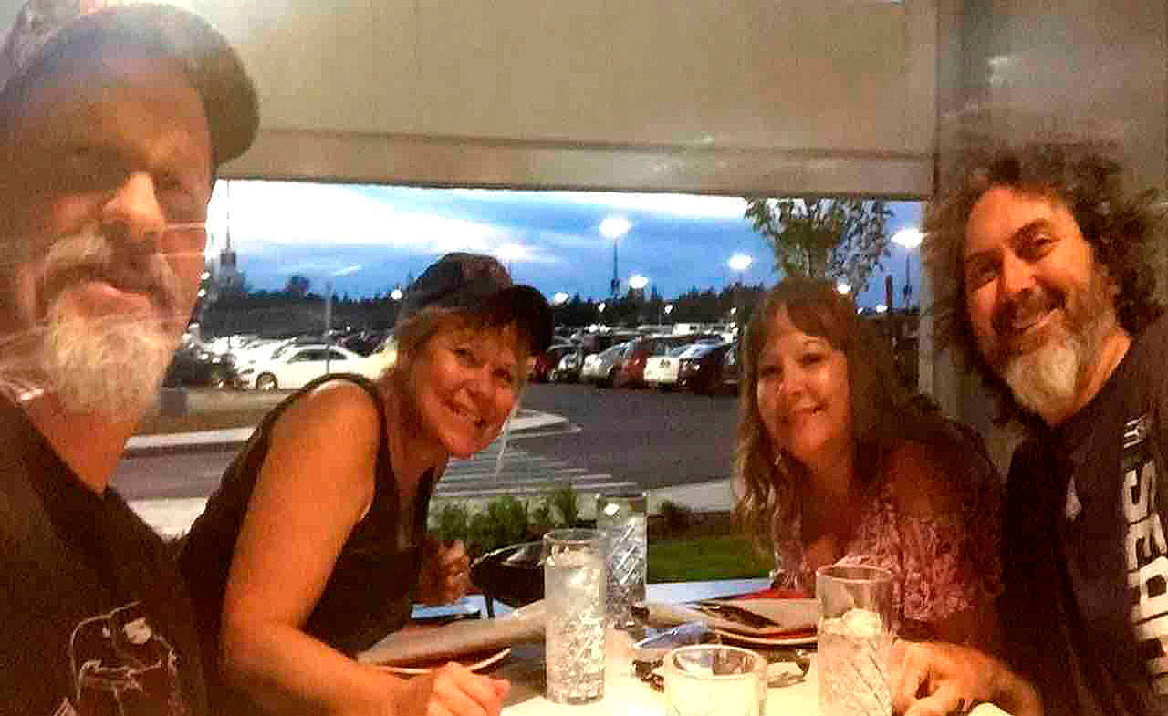 Family and friends, from left, Wayne and Brenda Priest of Sequim and Patti and William Neudorfer of Vancouver enjoy a meal together.