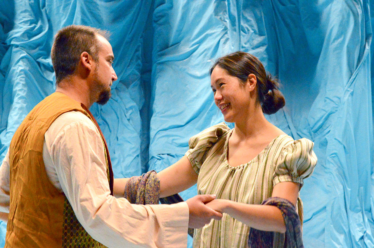 Young Victor Frankenstein (Jeremy Pederson) and his bride Elizabeth (Teresa McCaffrey) appear in “Playing with Fire (After Frankenstein),” opening tonight at the Port Angeles Community Playhouse. (Diane Urbani de la Paz/for Peninsula Daily News)