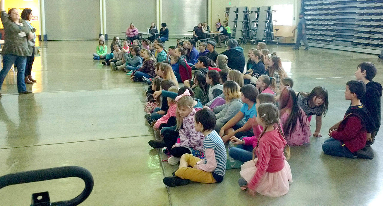 Lindsey Wayne and Sarah Price of Missoula Children’s Theatre meet the cast and crew from the West End for this week’s presentation of “Blackbeard the Pirate.” (Zorina Barker/for Peninsula Daily News)