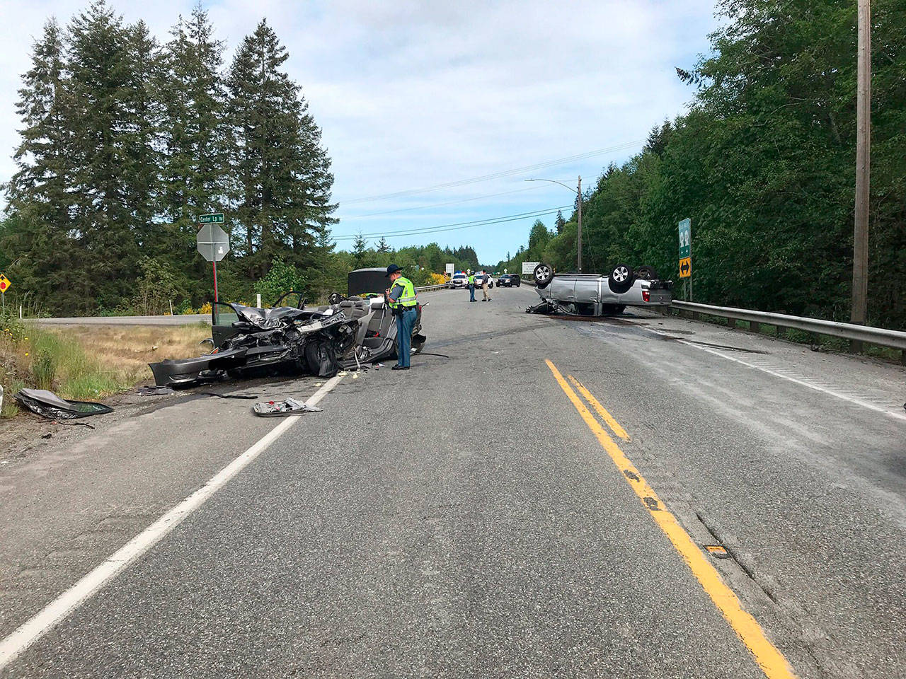 Troopers investigate a Monday afternoon wreck at Center Road and state Highway 104 near Chimacum. (State Patrol)