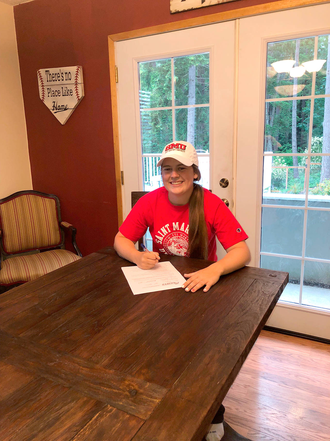 Port Angeles’ Lauren Lunt will continue her college softball career at NCAA Division II Saint Martin’s University in Lacey.