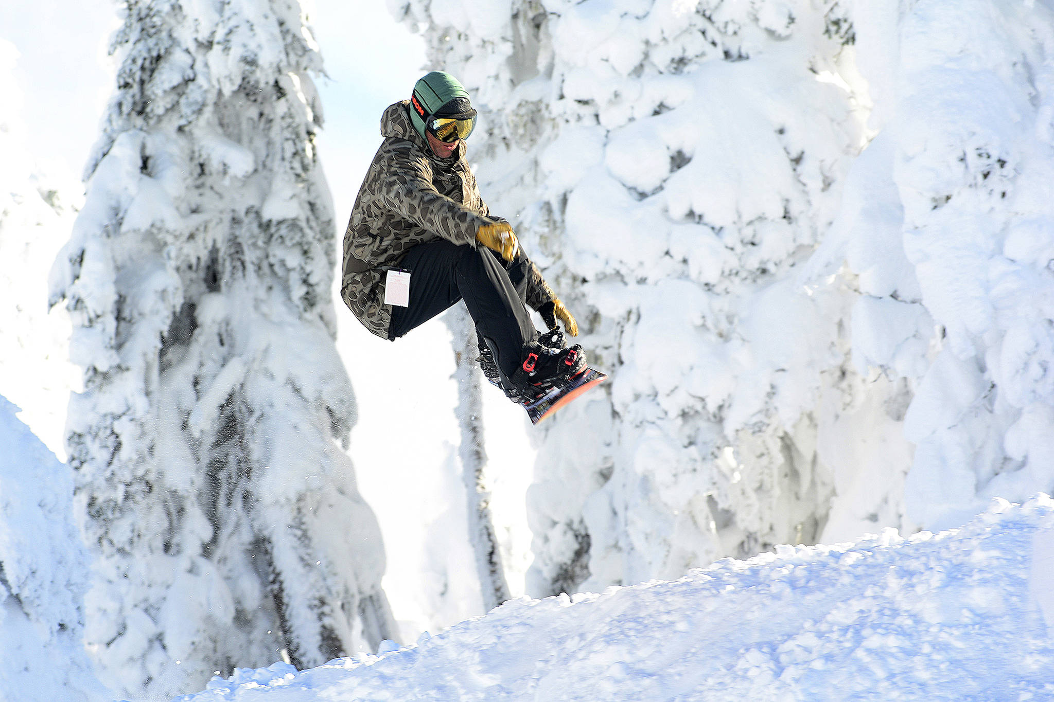 GNU Snowboards team rider Temple Cummins snowboards at Hurricane Ridge. (Jesse Major/Peninsula Daily News)