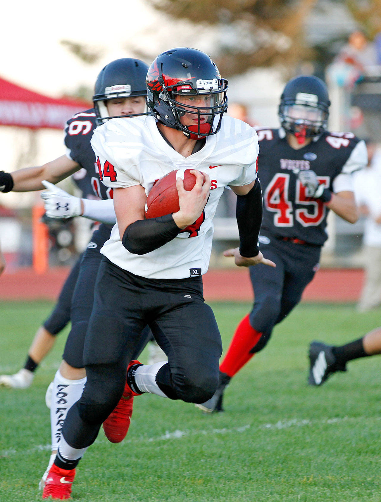 Port Townsend’s Dylan Tracer rumbled for 182 rushing yards and scored four touchdowns in the Redhawks’ 49-16 win over Coupeville on Friday. Lisa Jensen/photo