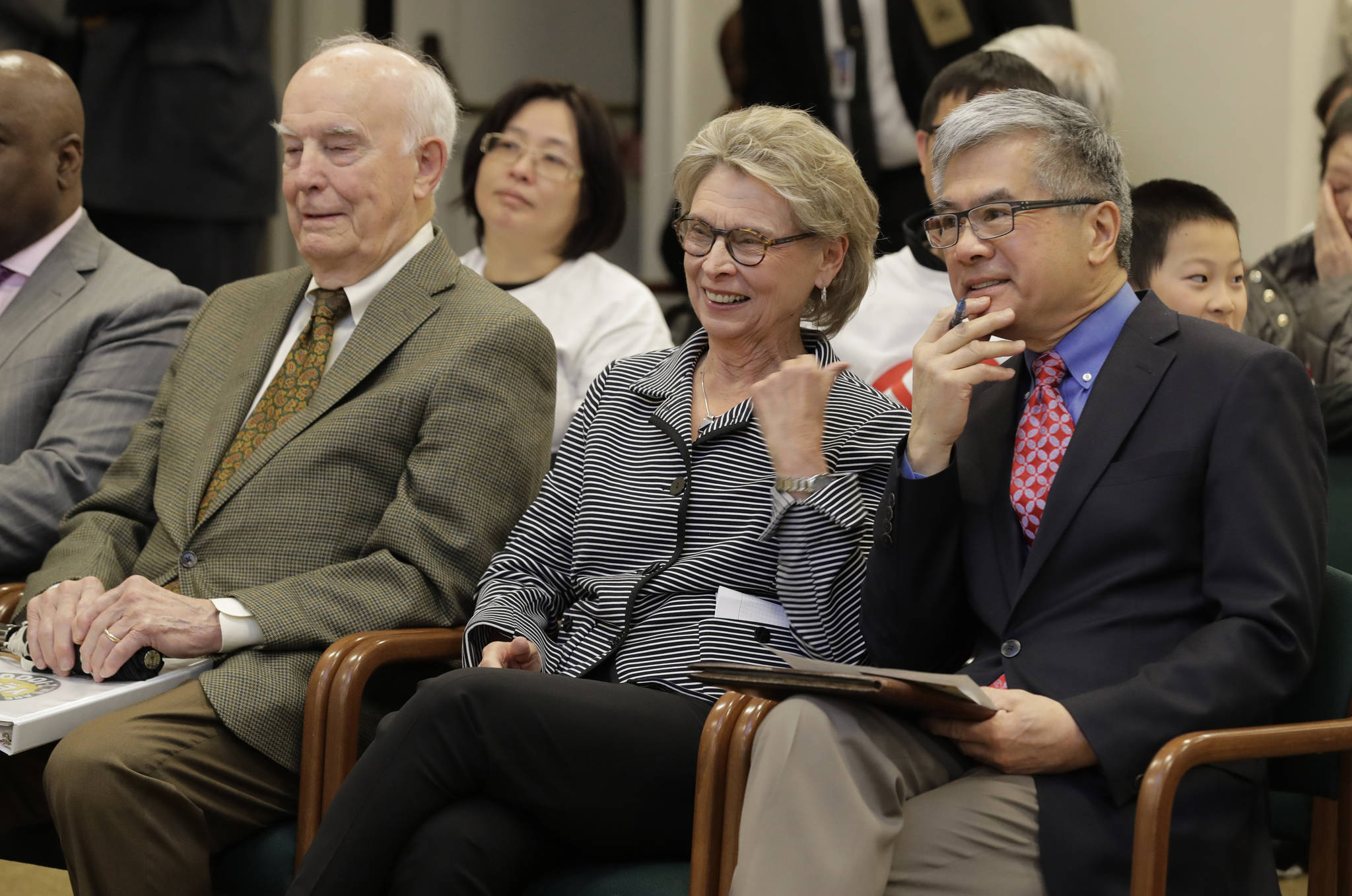 In this April 18, 2019, file photo, former Washington governors (from left) Dan Evans, Chris Gregoire and Gary Locke sit together before testifying in favor of Initiative 1000 before a joint Washington state House and Senate committee at the Capitol in Olympia. (AP Photo/Ted S. Warren, File)