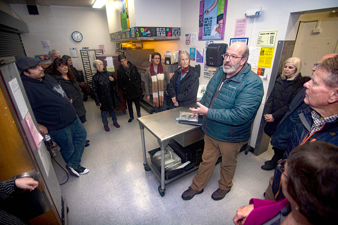 Port Angeles School District Facilities and Maintance Director Nolan Duce discusses the condition of Stevens Middle School during a tour of the school Monday, Jan. 6, 2020. (Jesse Major)