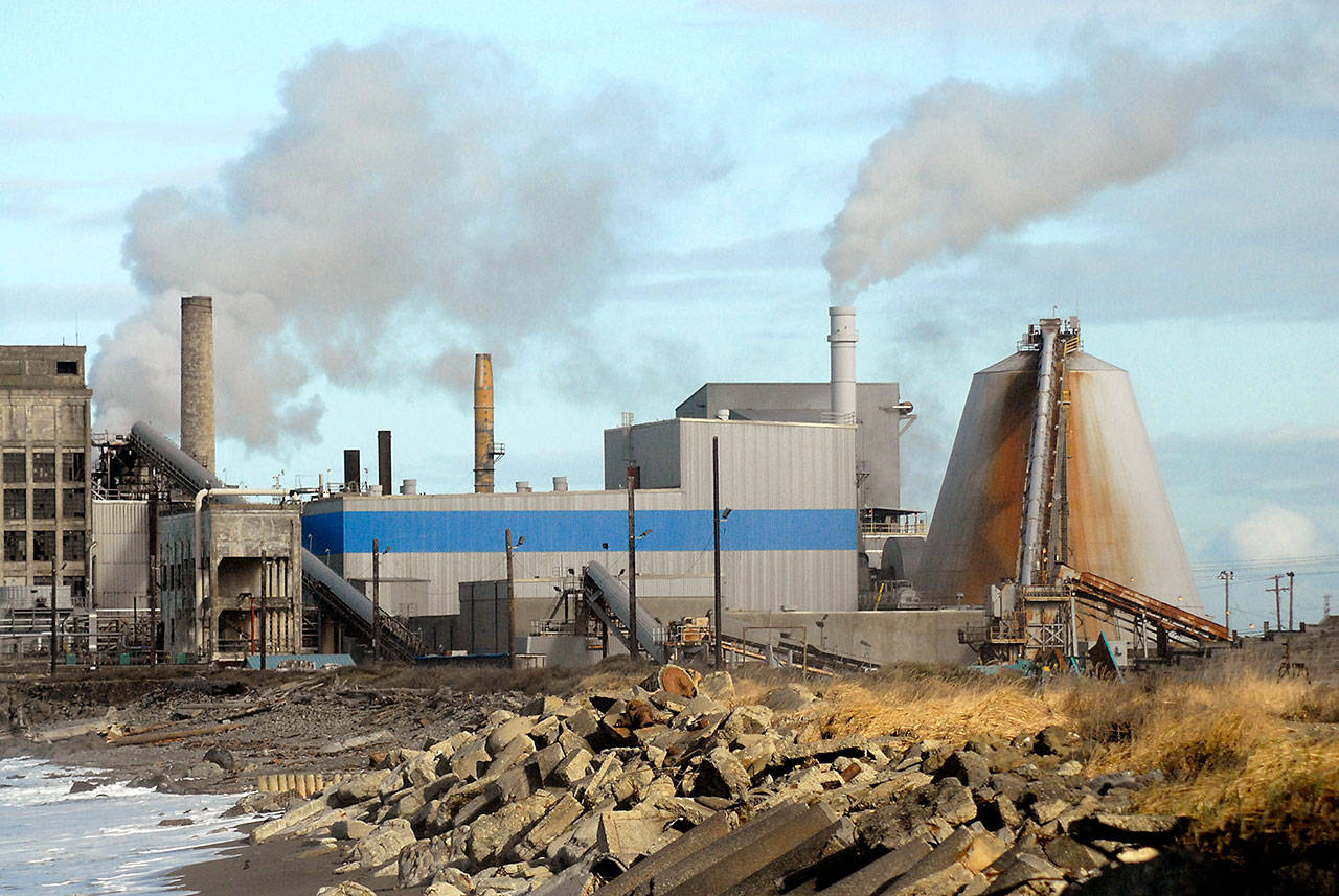 Steam pours from the McKinley Paper mill in Port Angeles on Wednesday, Feb. 26, 2020, as the mill begins operations to produce containerboard and packaging-grade brown paper. (Keith Thorpe/Peninsula Daily News)
