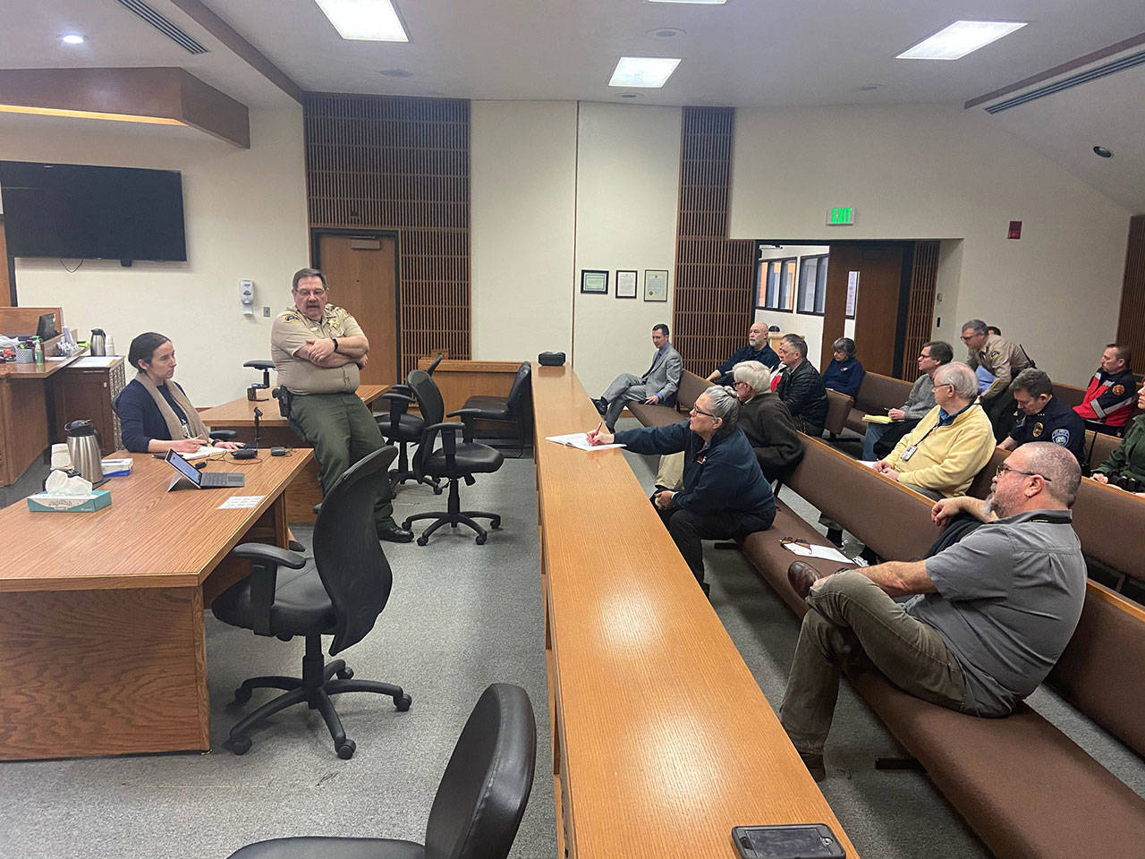 Clallam County Public Health Officer Dr. Allison Berry Unthank, left, and Clallam County Undersheriff Ron Cameron provide an update on the COVID-19 outbreak Monday, March 9, 2020, at the Clallam County Courthouse. There were no confirmed cases in Clallam County as of Monday, Unthank said. (Rob Ollikainen/Peninsula Daily News)