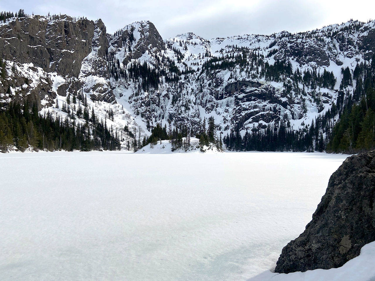An ice-covered Lake Angeles is shown Sunday, March 22, 2020. (Rob Ollikainen/Peninsula Daily News)