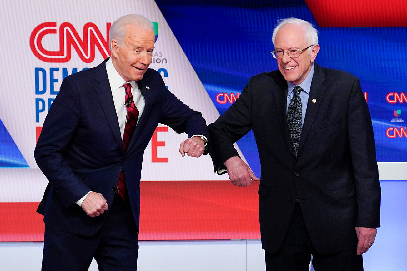 Sanders backs Biden as ex-rivals join forces to beat Trump