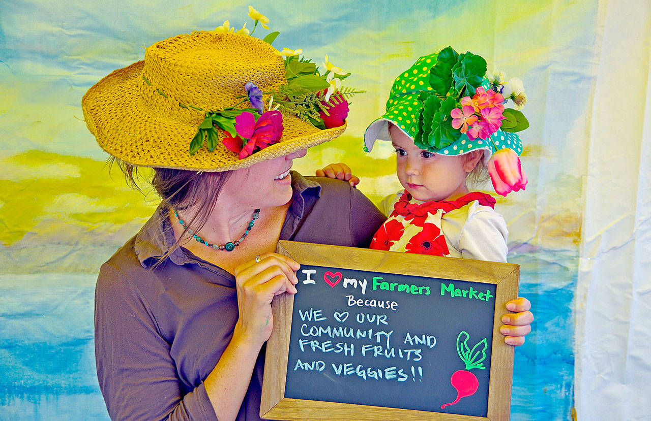 Naomi Spechap and her daughter, Solori, enjoy a day at the Chimacum Farmers Market in 2019. (Photo courtesy of Rodney Just)