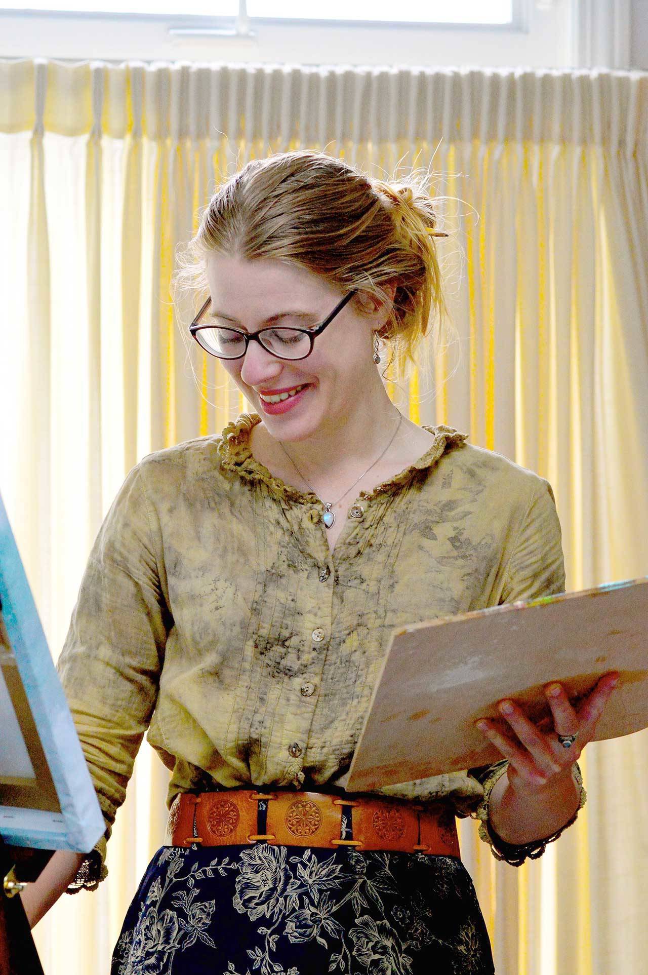 Port Townsend designer Rose Burt created a poster bearing a masked goddess. (Diane Urbani de la Paz/for Peninsula Daily News)