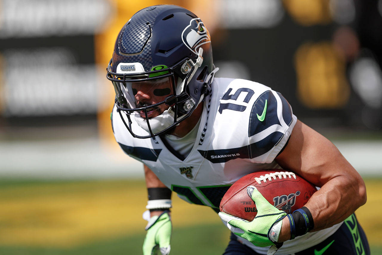 Seattle Seahawks wide receiver John Ursua (15) warms up before an NFL football game against the Pittsburgh Steelers, Sunday, Sept. 15, 2019, in Pittsburgh. (Don Wright/Associated Press)