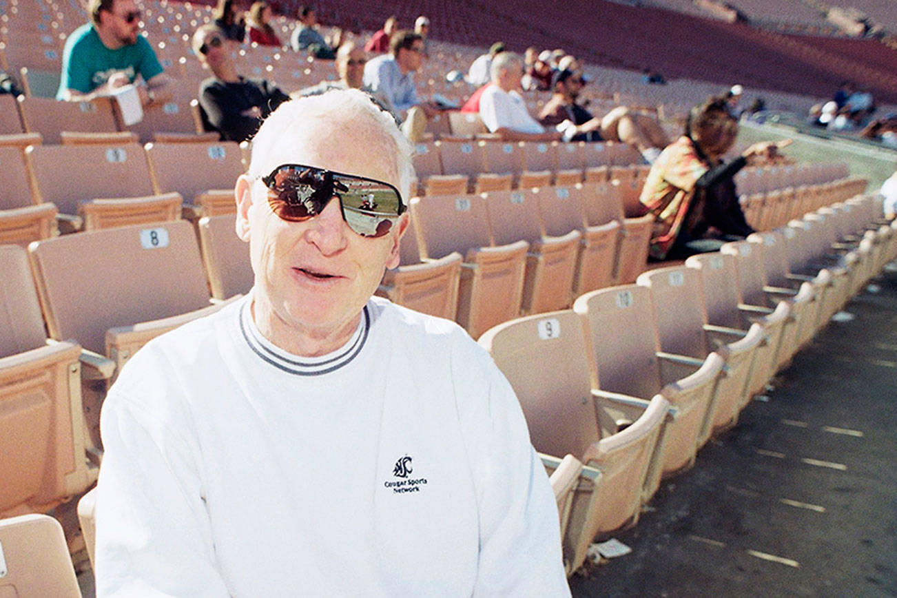 COLLEGE FOOTBALL: Legendary broadcaster Bob Robertson was like a family member to many Cougars