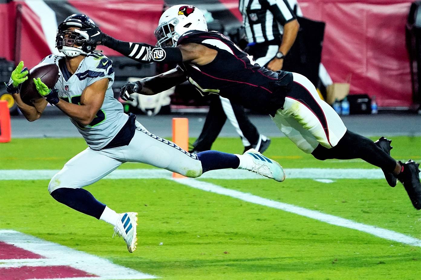 Seattle Seahawks wide receiver Tyler Lockett (16) pulls in a touchdown catch as Arizona Cardinals cornerback Patrick Peterson defends during the first half of an NFL football game, Sunday, Oct. 25, 2020, in Glendale, Ariz. (Rick Scuteri/Associated Press)