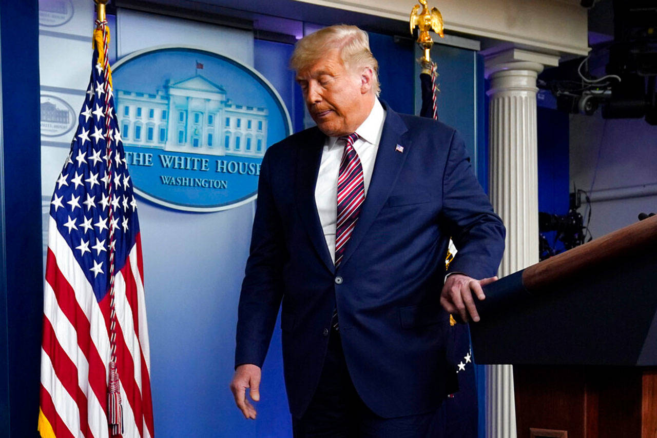 President Donald Trump leaves the podium after speaking at the White House on Thursday, Nov. 5, 2020, in Washington. (Evan Vucci/Associated Press)