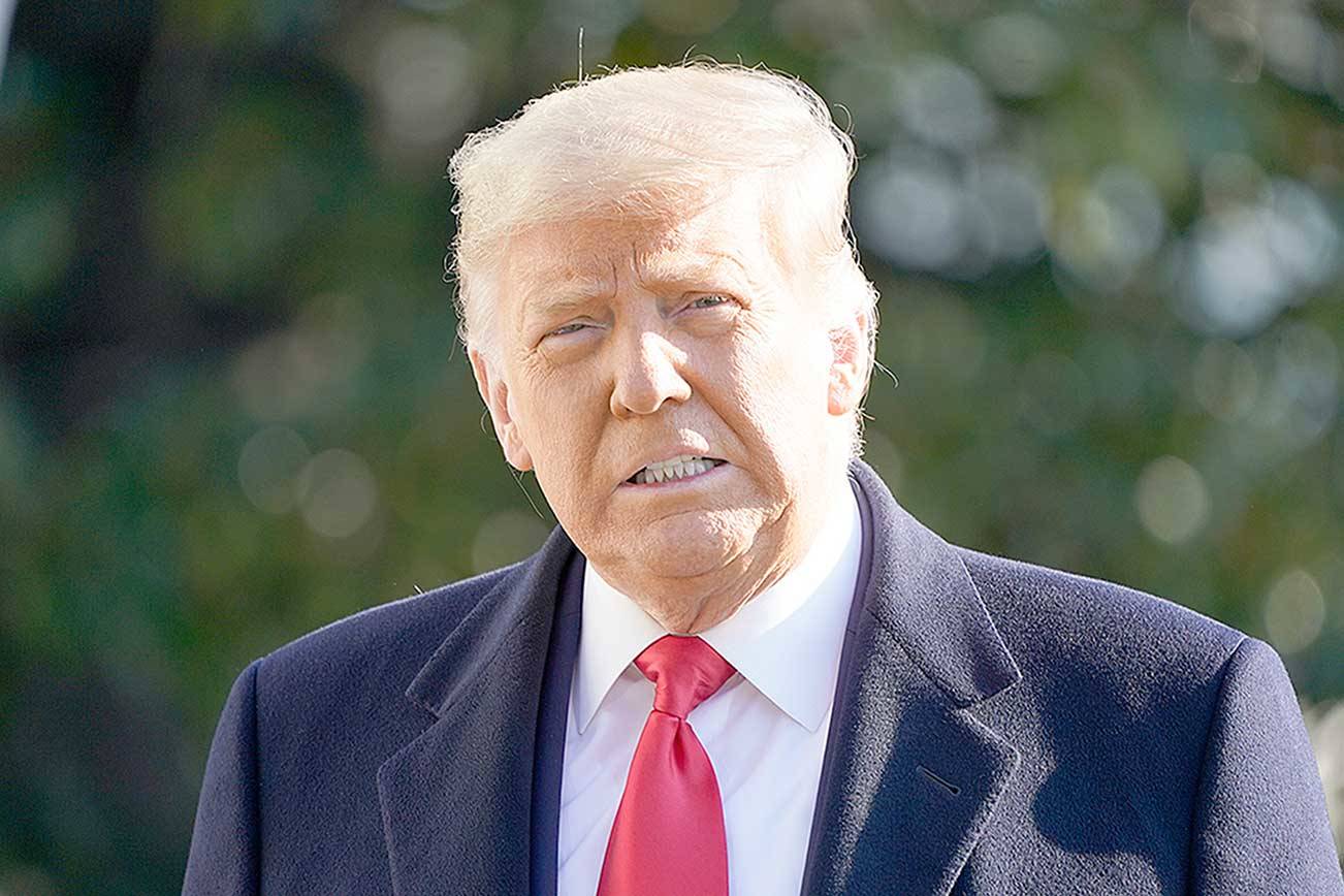 President Donald Trump speaks to the media before boarding Marine One on the South Lawn of the White House on Tuesday in Washington. (Gerald Herbert/The Associated Press)