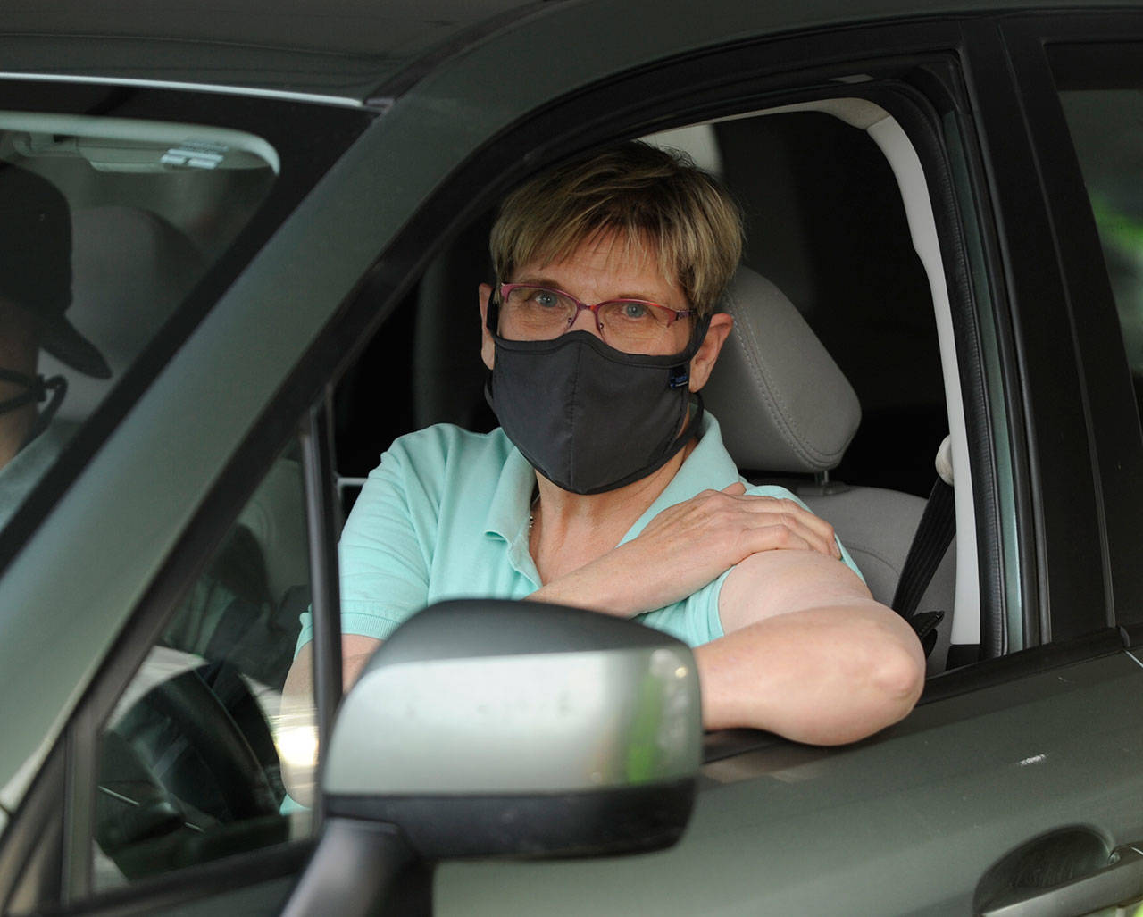 Sequim resident Susan Sorensen is ready for her COVID-19 vaccination shot at the Jamestown S’Klallam Tribe’s vaccination clinic on Jan. 14. Sequim Gazette photo by Michael Dashiell
