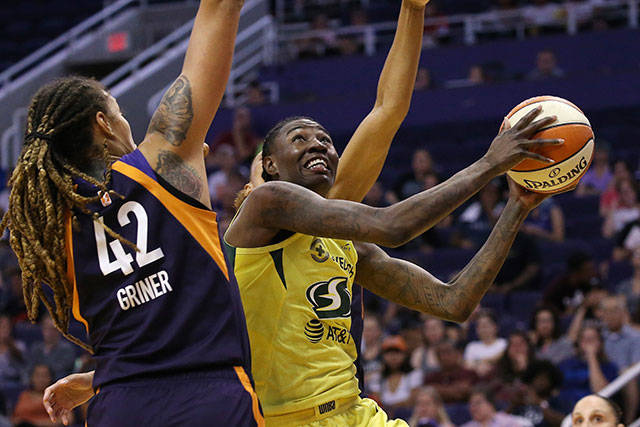 Seattle Storm forward Natasha Howard, right, drives past Phoenix Mercury center Brittney Griner (42) during the first half of a WNBA basketball game in Phoenix on Sept. 3, 2019. The New York Liberty acquired Natasha Howard from the Seattle Storm as part of a three-team trade on Wednesday. (Ross D. Franklin/The Associated Press file photo)