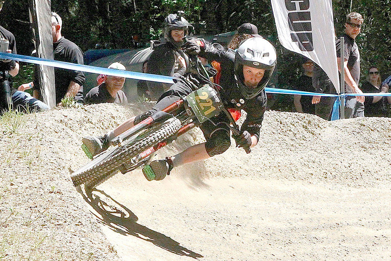 Payden Salliotte of Medford, Ore., competes in the Cat 2 13-14 race at the return of the Northwest Cup at Dry Hill west of Port Angeles. (Dave Logan/for Peninsula Daily News)