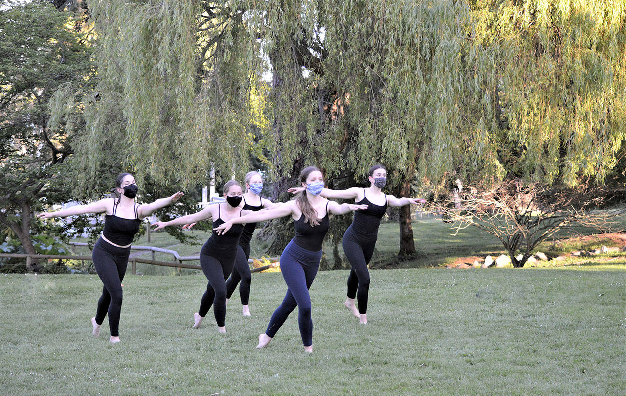 Ling Hui’s Dance students, from left, Jeannette Patric, Maeve Kenney, Anabel Moore, Maggie Emery and Matia Reimnitz, mark the end of the school year with a performance Friday in Port Townsend’s Chetzemoka Park. (Diane Urbani de la Paz/Peninsula Daily News)