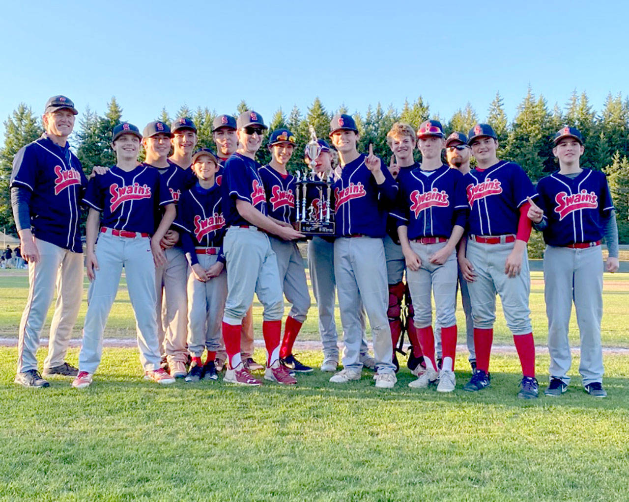 Swain’s captured the Olympic Junior Babe Ruth baseball championship with a 12-7 win over Athlete’s Choice. Team members and coaches are from left, coach Eric Flodstrom, Jude Wallace, Jordan Shumway, Hunter Tennell, Khyler Thompson, Joseph Ritchie, Aiden Swenson, Bryton Amsdill, Trae Hanson (behind trophy), Tanner Jacobsen, Luke Flodstrom, Tate Alton, coach Tim Adams, Ryland Proettie and Cody Martin.