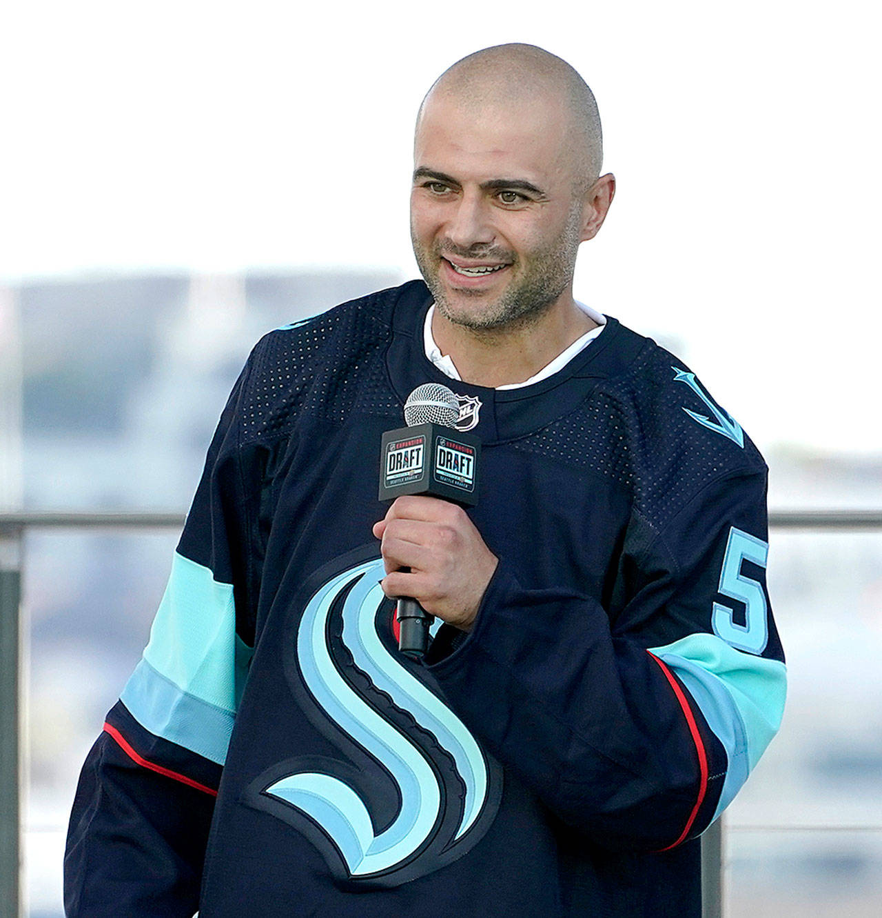 Mark Giordano, a defender from the Calgary Flames, speaks last Wednesday after he was introduced as a new Seattle Kraken player during the Kraken’s NHL hockey expansion draft event in Seattle. (Ted S. Warren/The Associated Press)
