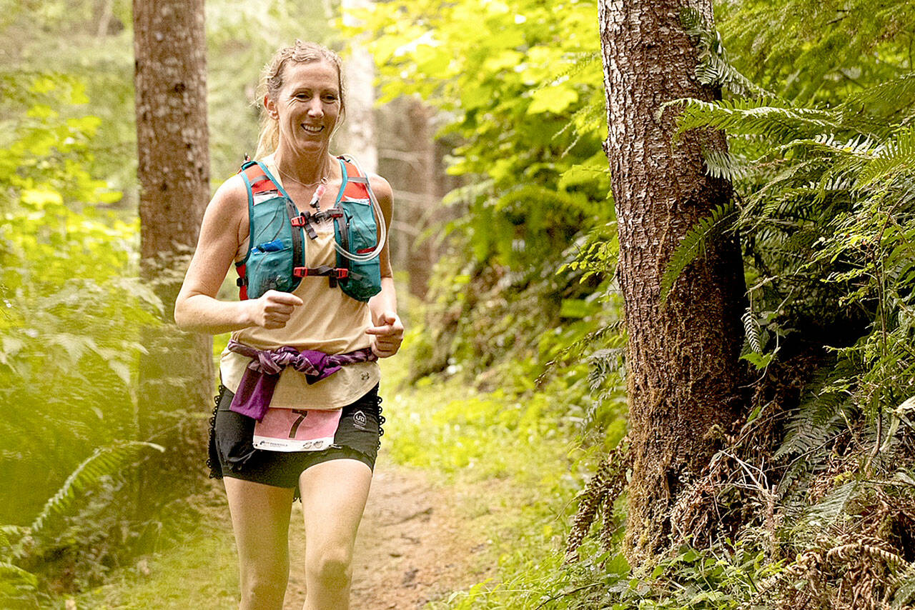 Rachael Canavan of Sequim runs in the 50K race Saturday in the annual Great Olympic Adventure Trail run west of Port Angeles. (Matt Sagen photo)