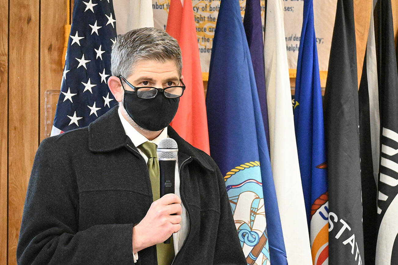 Featured speaker Mark Ozias, a Clallam County commissioner, lauds veterans for their service and ability to help restore their communities at a special Veterans Day event at American Legion Jack Grennan Post No. 26 in Sequim. Michael Dashiell/Olympic Peninsula News Group