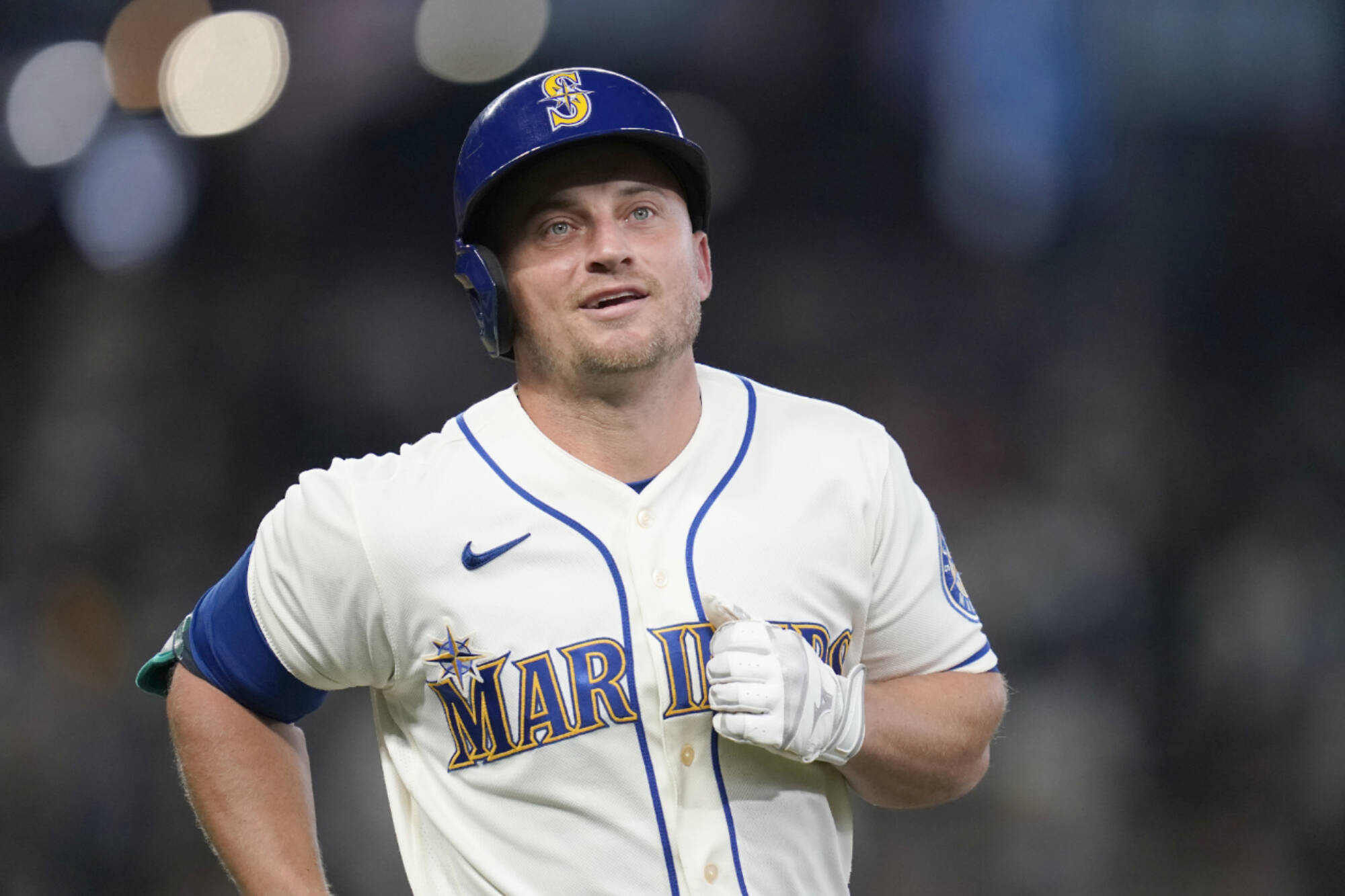 FILE - Seattle Mariners' Kyle Seager heads off the field after flying out against the Los Angeles Angels in a baseball game Sunday, Oct. 3, 2021, in Seattle. Seager announced his retirement on Wednesday, Dec. 29, 2021, after 11 seasons in the majors, all with the Mariners.  (AP Photo/Elaine Thompson, File)